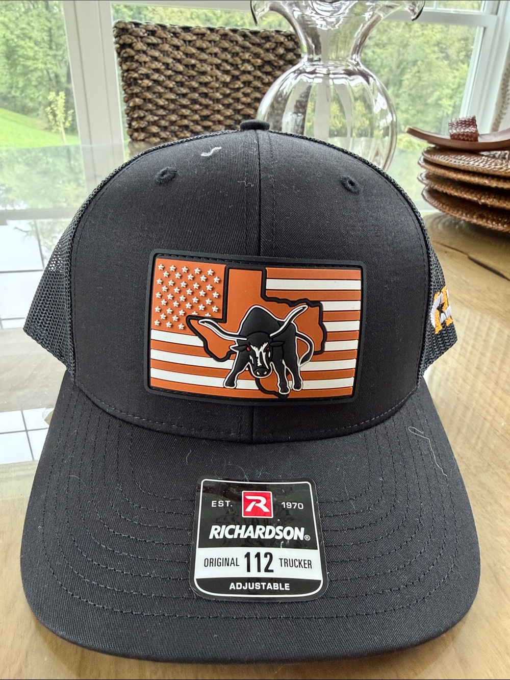 Black Trucker Hat with Orange USA Longhorn Patch
